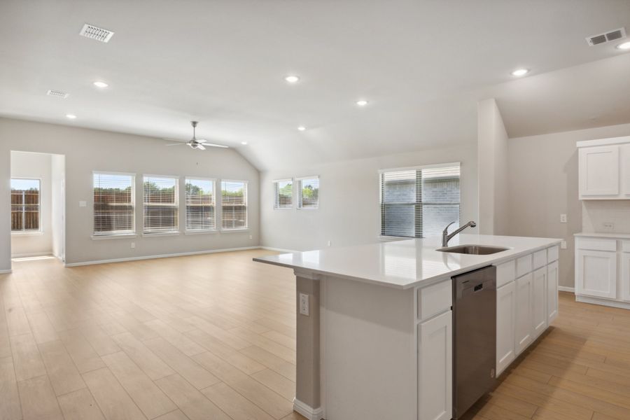 Kitchen in the Diamond home plan by Trophy Signature Homes – REPRESENTATIVE PHOTO