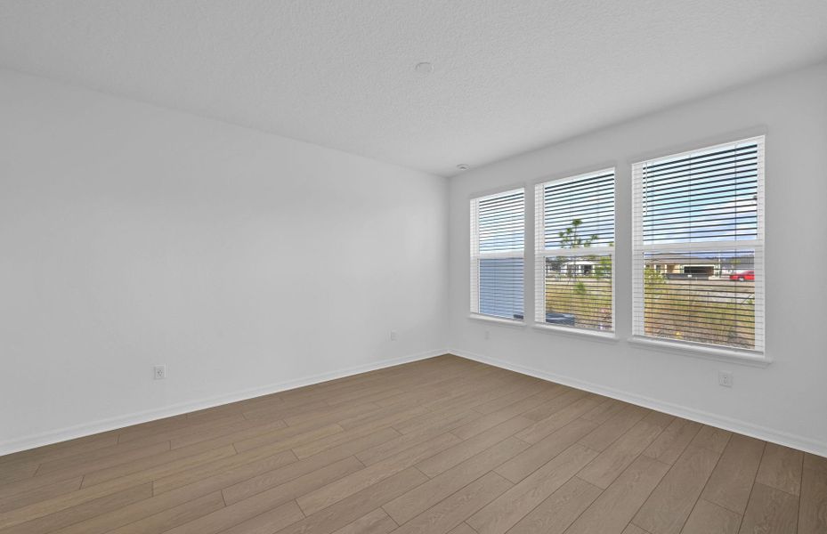 Spacious, unfurnished interior of a new home in Del Webb Wildlight, Yulee (Image 18).