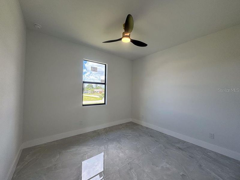 Spacious, unfurnished interior of a new home in , Port Charlotte (Image 19).