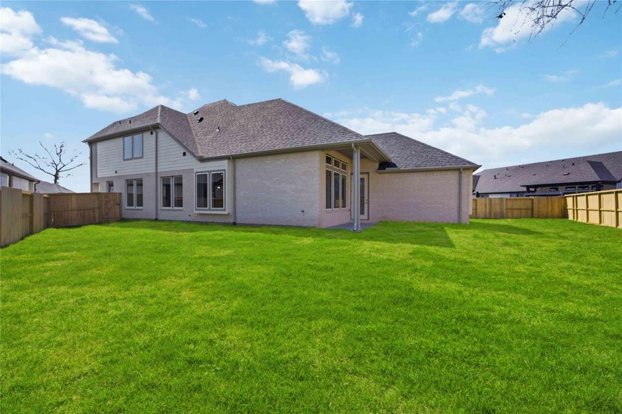 Exterior details and patio area of a home in Sienna, Missouri City (Image 4). Exterior details and patio area of a home in Sienna, Missouri City (Image 4).