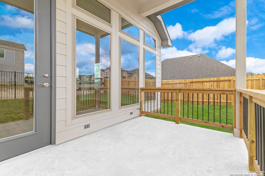 Exterior details and patio area of a home in Ventana, Bulverde (Image 2).