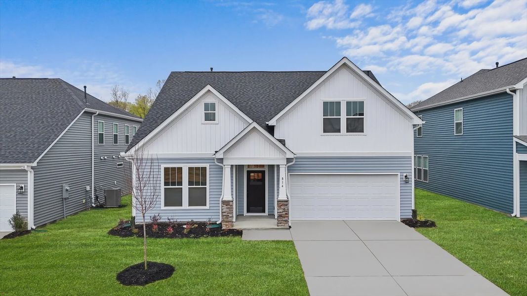 Representative exterior photo of a completed home built from the Cooper 3 by DRB Homes in Woodglen, Piedmont, SC (Image 20).
