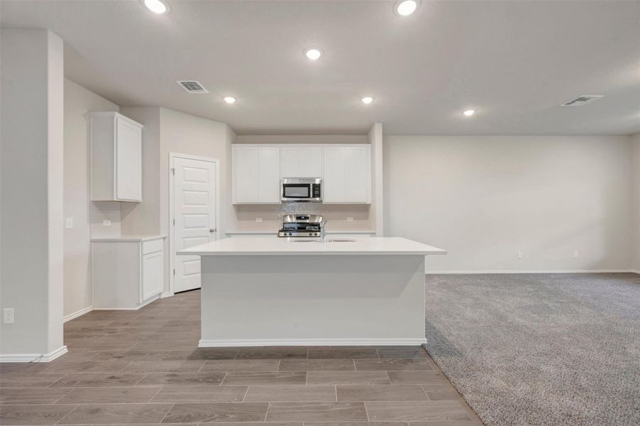Furnished interior view inside a new home in Heritage, Dripping Springs (Image 11).