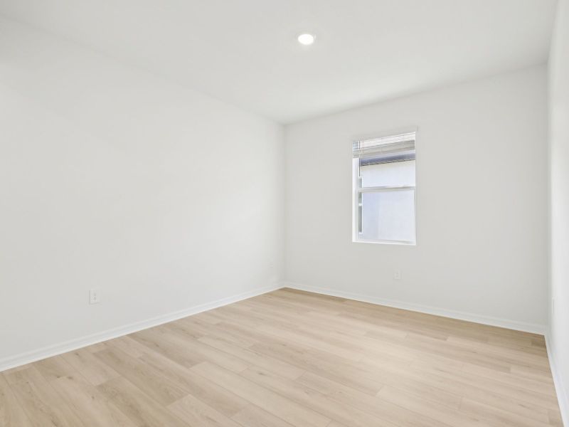 Spacious, unfurnished interior of a new home in Coasterra - Reserve Series, Palmetto (Image 16).