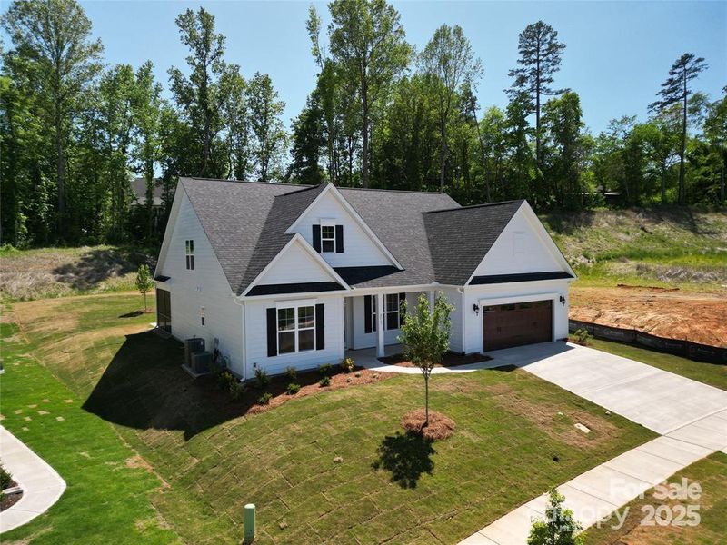Front exterior of a new home in Red Hill, Concord, NC, highlighting curb appeal (Image 2).