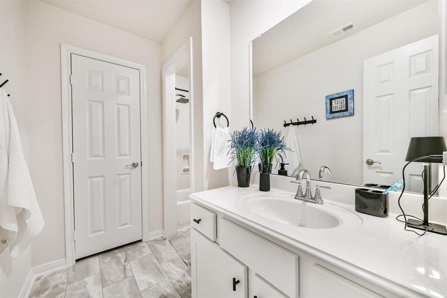 Furnished interior view inside a new home in , League City (Image 35).