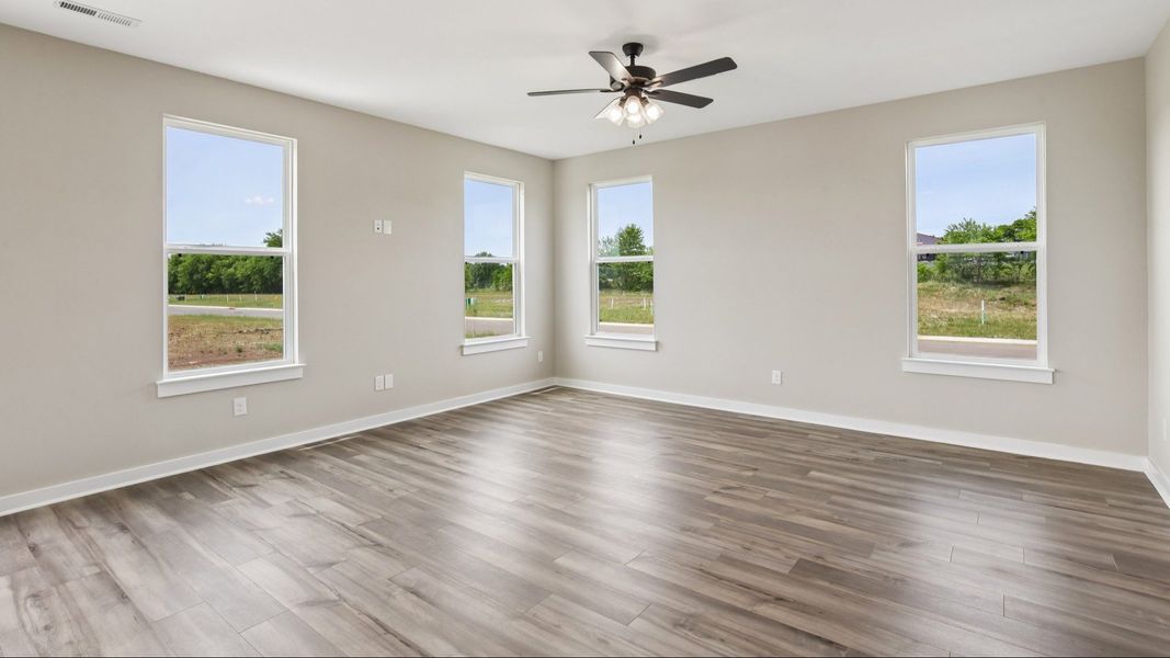 Living Room with hard surface flooring and large windows
