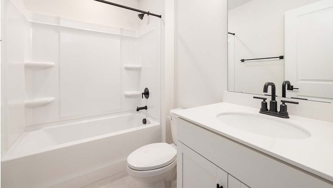 Representative furnished interior of a home built from the Summit by D.R. Horton in Sylvan Creek, Denver (Image 28).