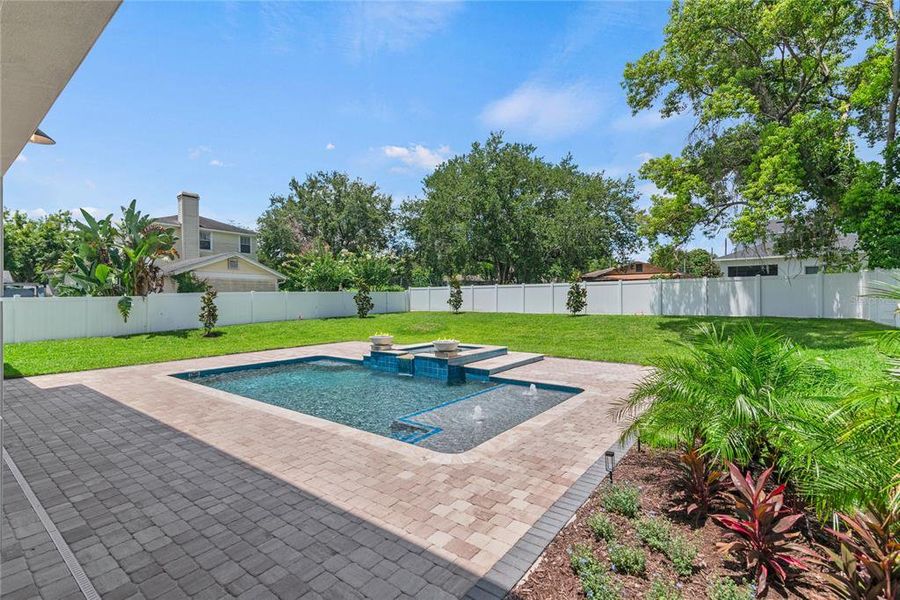 Heated pebbletec saltwater pool with spa, sunshelf with water feature, variable speed high efficiency pump, and 2 gas fireballs Heated pebbletec saltwater pool with spa, sunshelf with water feature, variable speed high efficiency pump, and 2 gas fireballs