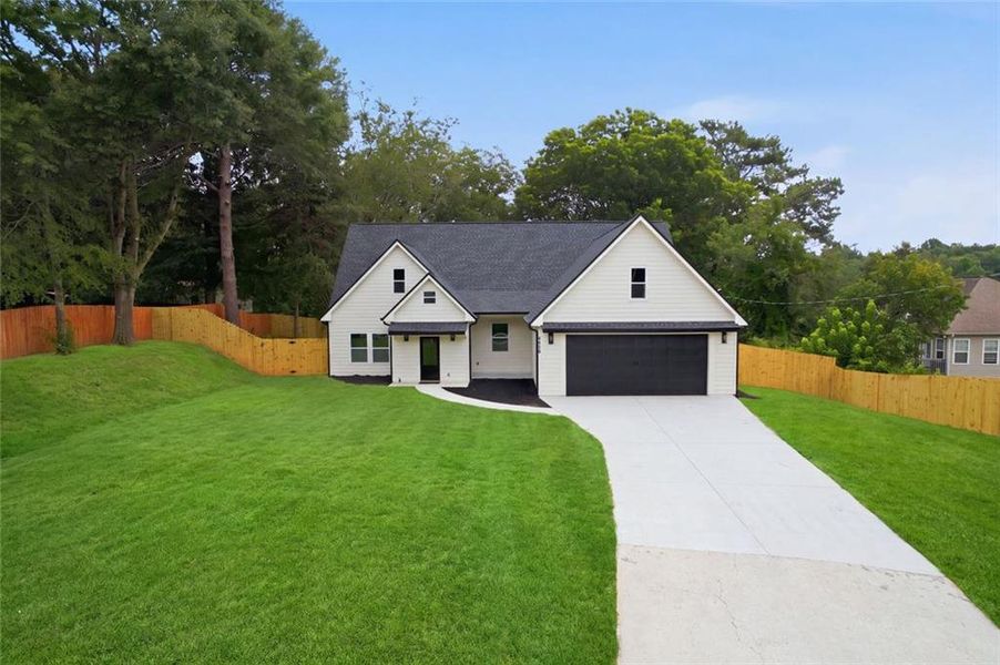 Front exterior of a new home in , Douglasville, GA, highlighting curb appeal (Image 29).