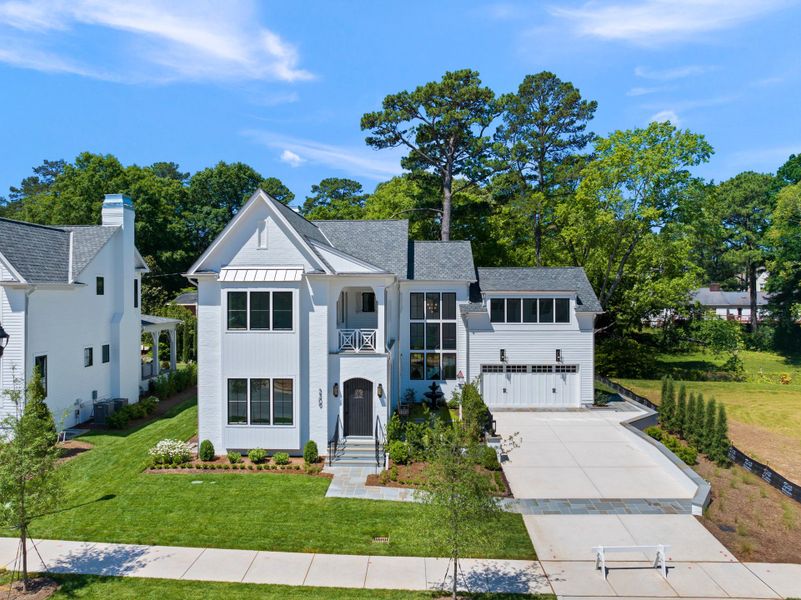 Representative exterior photo of a completed home built from the Olivia by Homes by Dickerson in The Founding at Blue Ridge, Raleigh, NC (Image 2). Representative exterior photo of a completed home built from the Olivia by Homes by Dickerson in The Founding at Blue Ridge, Raleigh, NC (Image 2).
