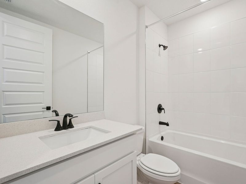 Furnished interior view inside a new home in Oakfield Trails - Signature Series, Parrish (Image 8). Furnished interior view inside a new home in Oakfield Trails - Signature Series, Parrish (Image 8).