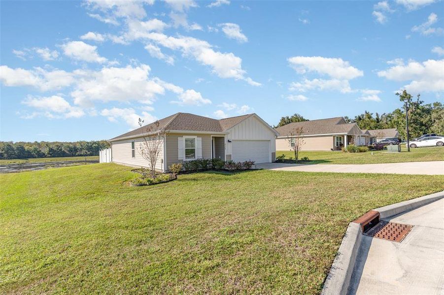 Front exterior of a new home in , Lake City, FL, highlighting curb appeal (Image 2).