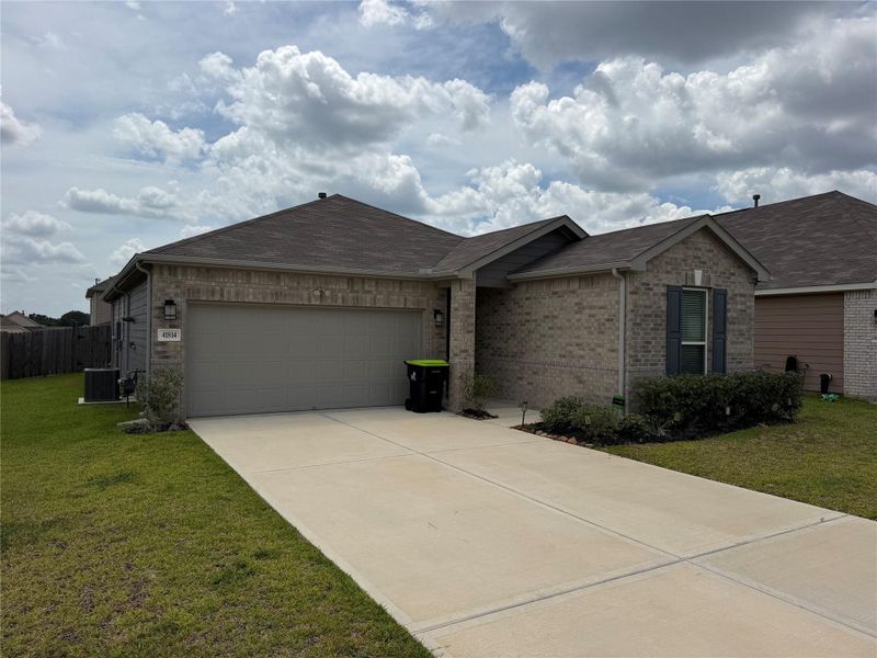 Front exterior of a new home in , Magnolia, TX, highlighting curb appeal (Image 2). Front exterior of a new home in , Magnolia, TX, highlighting curb appeal (Image 2).