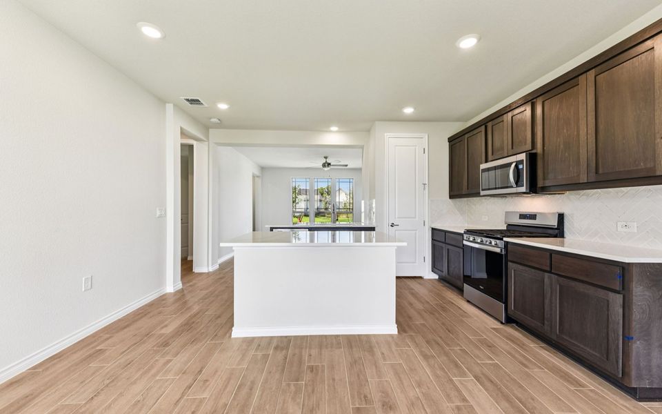 Furnished interior view inside a new home in Kissing Tree, San Marcos (Image 8).
