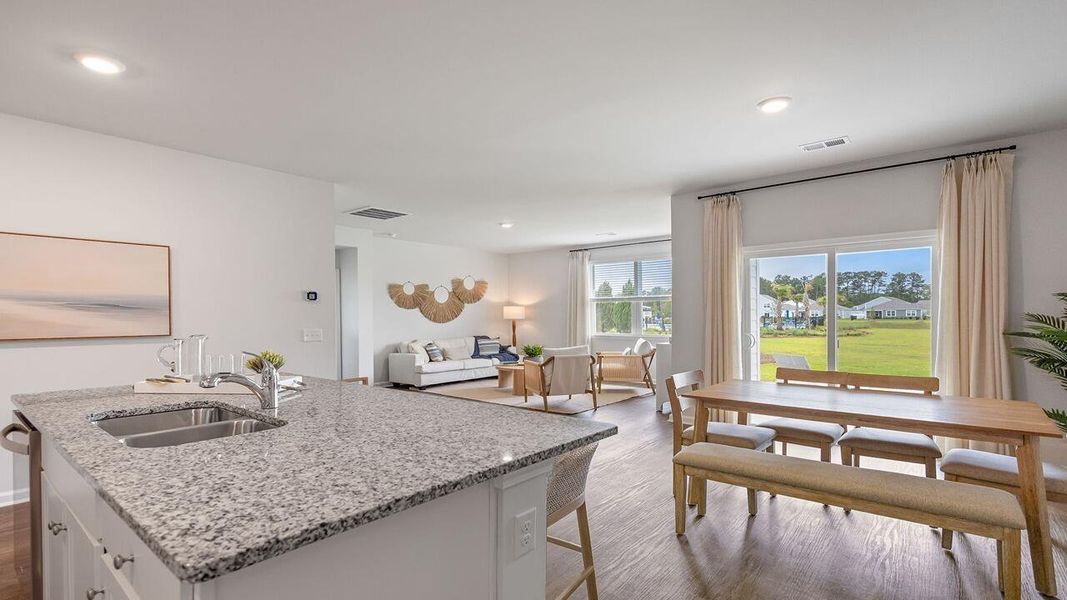 Furnished interior view inside a new home in Pine Hills at Cane Bay, Summerville (Image 14). Furnished interior view inside a new home in Pine Hills at Cane Bay, Summerville (Image 14).