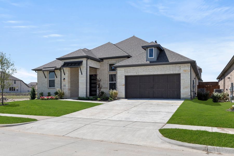 Representative exterior photo of a completed home built from the Elizabeth - 60 ft Home Site by Rockwell Homes in Nelson Lake Estates, Rockwall, TX (Image 29). Representative exterior photo of a completed home built from the Elizabeth - 60 ft Home Site by Rockwell Homes in Nelson Lake Estates, Rockwall, TX (Image 29).