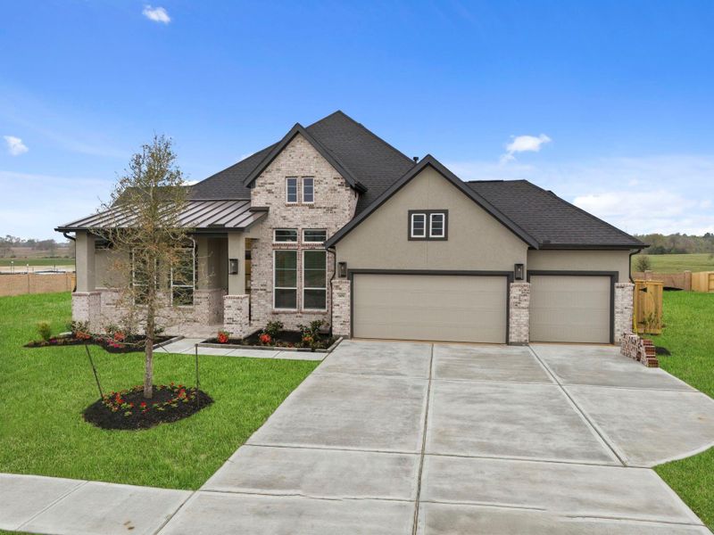 Front exterior of a new home in Briarley, Montgomery, TX, highlighting curb appeal (Image 21).