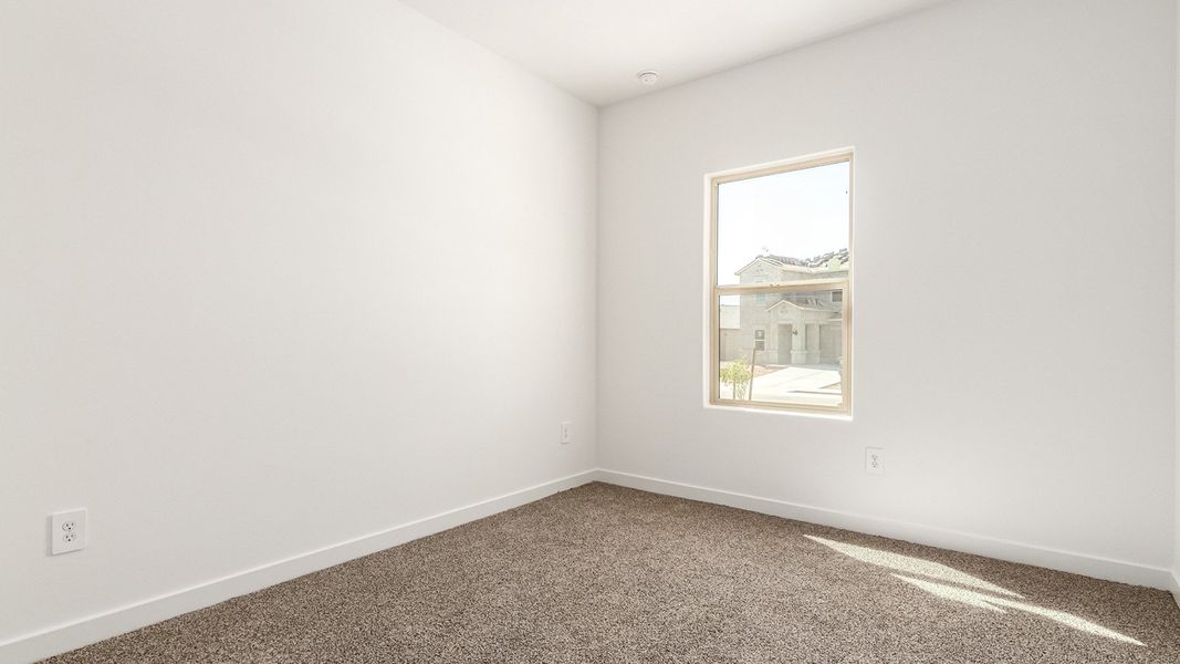 Representative unfurnished interior of a home built from the Baxter by D.R. Horton in The Oasis at Rocking K, Vail (Image 30).