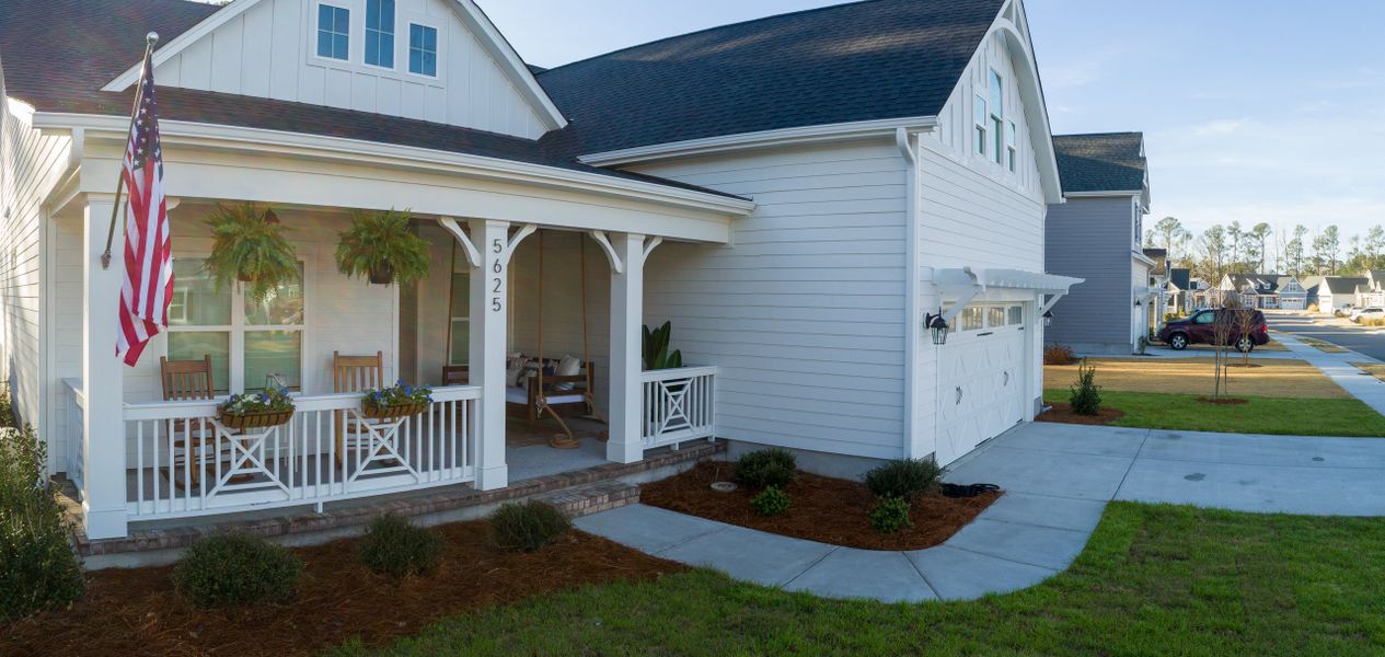 Representative exterior photo of a completed home built from the Ashton by Bill Clark Homes in Osprey Landing, Southport, NC (Image 27). Representative exterior photo of a completed home built from the Ashton by Bill Clark Homes in Osprey Landing, Southport, NC (Image 27).