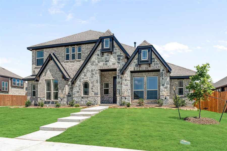 Front exterior of a new home in Trees Farm, DeSoto, TX, highlighting curb appeal (Image 23). Front exterior of a new home in Trees Farm, DeSoto, TX, highlighting curb appeal (Image 23).