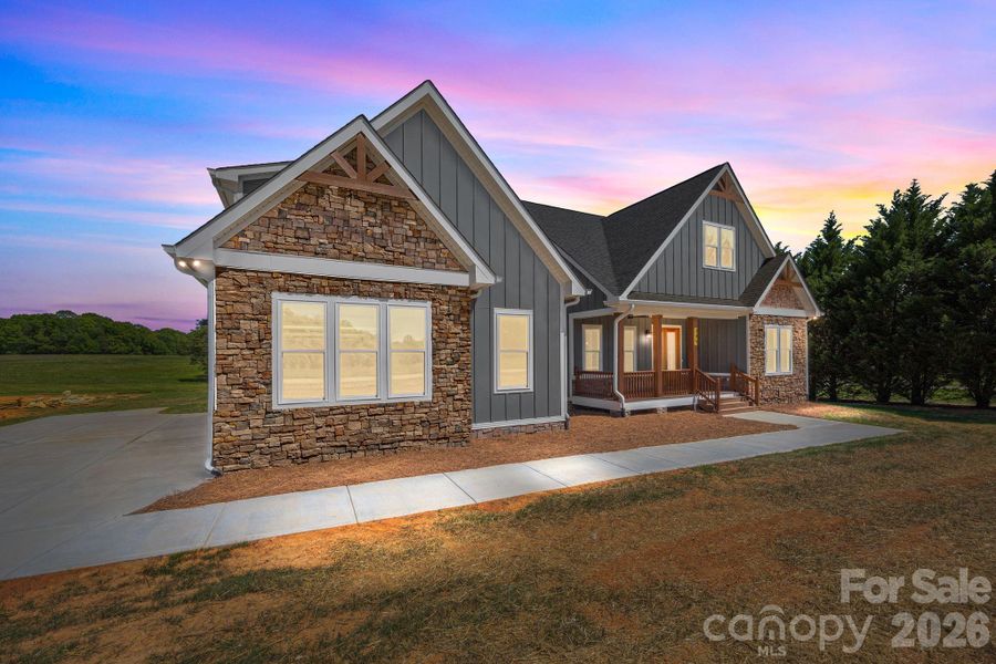 Front exterior of a new home in , Statesville, NC, highlighting curb appeal (Image 1). Front exterior of a new home in , Statesville, NC, highlighting curb appeal (Image 1).
