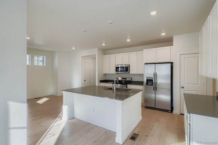 Furnished interior view inside a new home in , Thornton (Image 6).