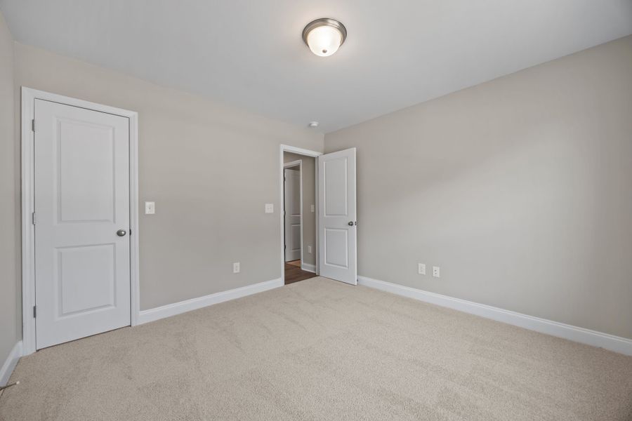 Spacious, unfurnished interior of a new home in Davenport Farms, Winterville (Image 37).