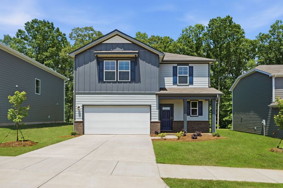 Front exterior of a new home in Grants Landing, Salisbury, NC, highlighting curb appeal (Image 1). Front exterior of a new home in Grants Landing, Salisbury, NC, highlighting curb appeal (Image 1).