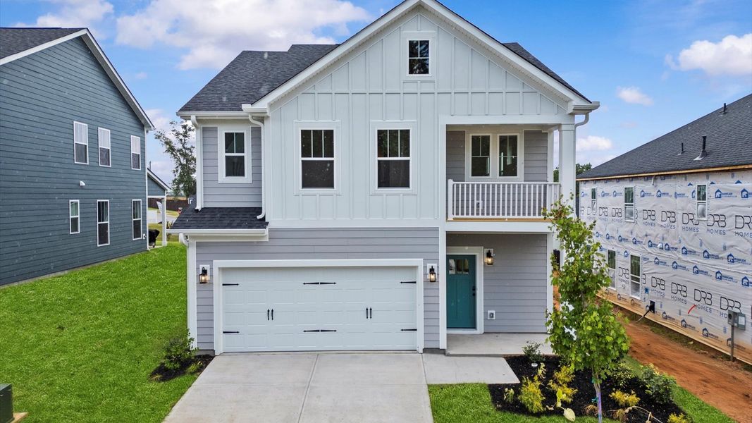 Representative exterior photo of a completed home built from the Mint by DRB Homes in Harrier Point, Woodruff, SC (Image 23).