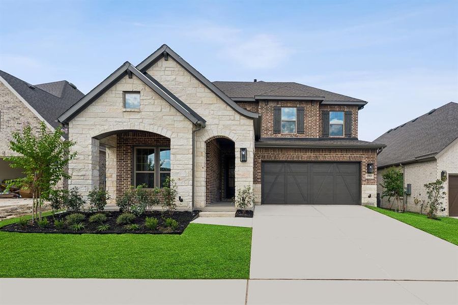 Front exterior of a new home in South Pointe  Cottage Series, Mansfield, TX, highlighting curb appeal (Image 2).