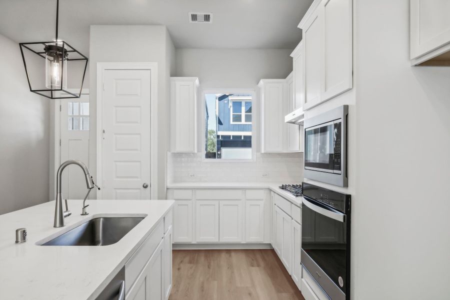 Photos are not of the actual home, but are photos of the builder home with same floorplan