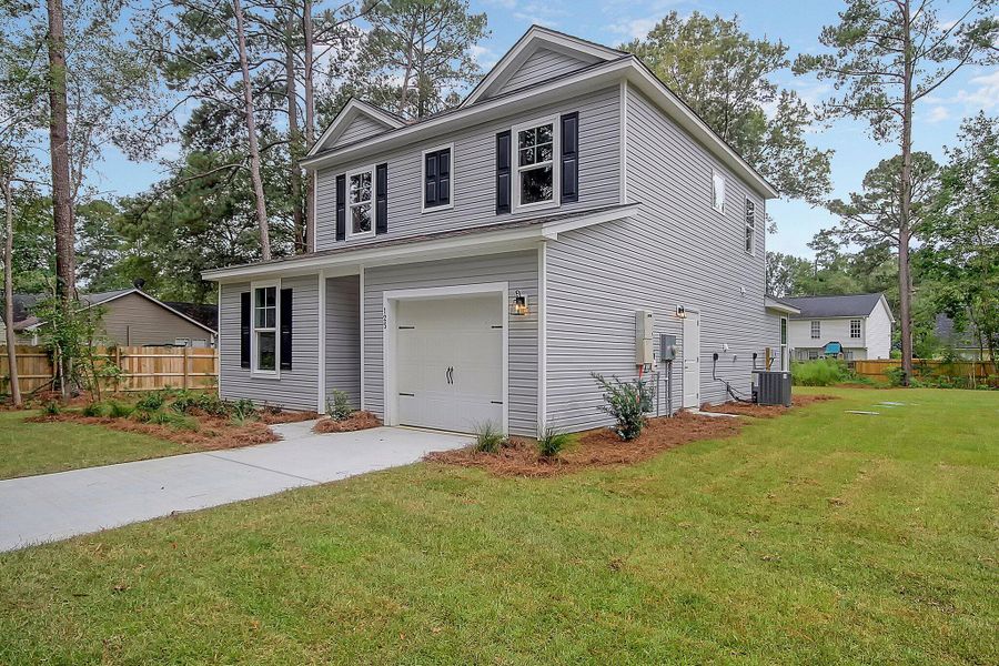 Front exterior of a new home in Founder's Park, Lincolnville, SC, highlighting curb appeal (Image 22).