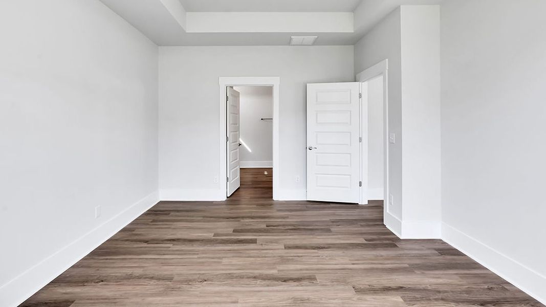 Spacious, unfurnished interior of a new home in The Haven at Indigo Preserve, Leland (Image 25).