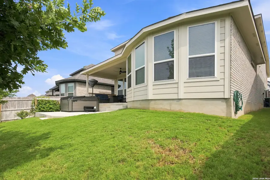 Exterior details and patio area of a home in Bison Ridge, San Antonio (Image 3).