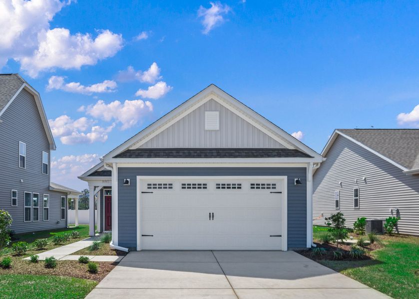 Front exterior of a new home in Coastal Club of the Carolinas, Calabash, NC, highlighting curb appeal (Image 1). Front exterior of a new home in Coastal Club of the Carolinas, Calabash, NC, highlighting curb appeal (Image 1).