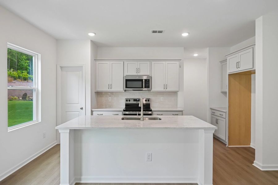 Furnished interior view inside a new home in Middleton Farms, Middlesex (Image 9).