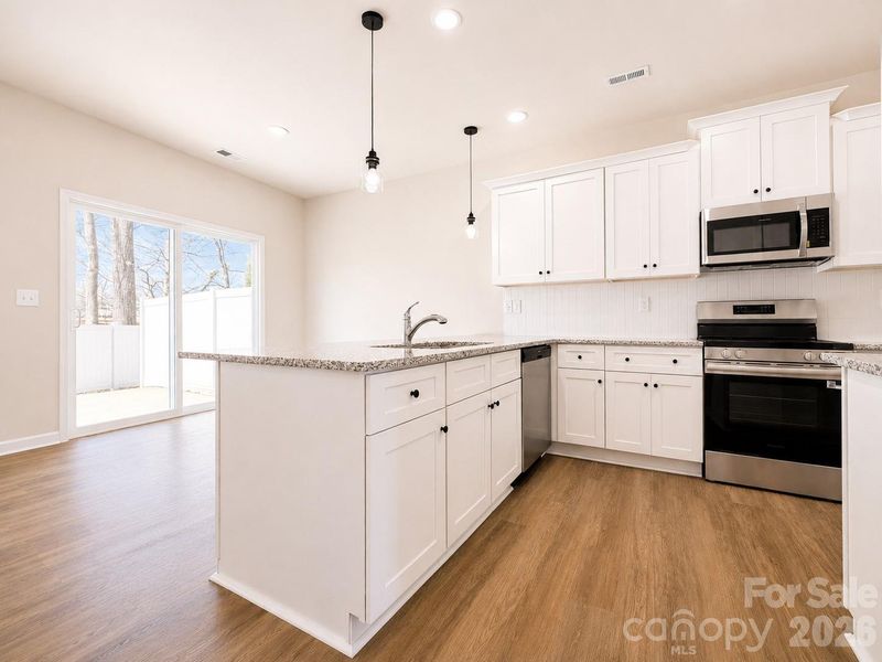 Furnished interior view inside a new home in , Charlotte (Image 6).