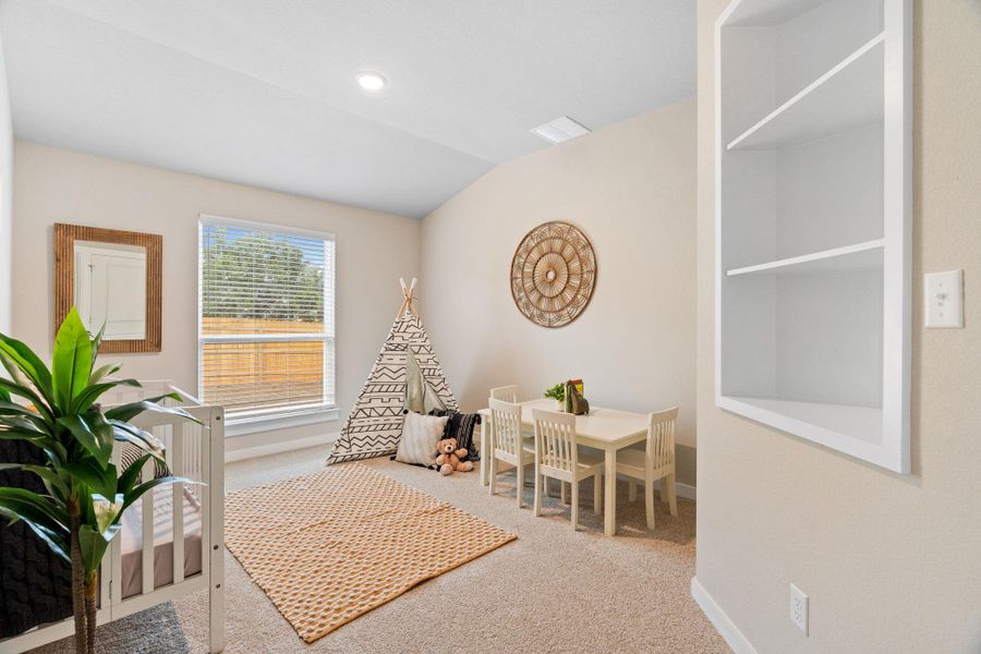 One of 4 bedrooms that could also be a home office - built in shelving and closet One of 4 bedrooms that could also be a home office - built in shelving and closet