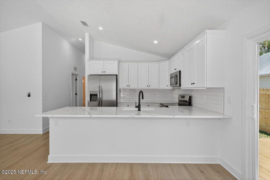 Furnished interior view inside a new home in , St. Augustine (Image 5).