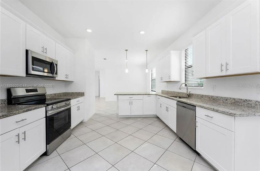Furnished interior view inside a new home in , Port Charlotte (Image 10).