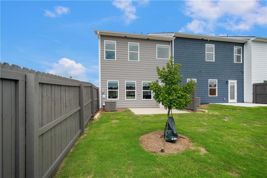 Exterior details and patio area of a home in Walden Park – The Collection, Jonesboro (Image 4).