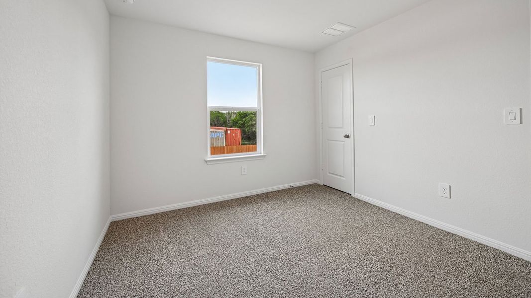 Spacious, unfurnished interior of a new home in Bar W Ranch, Leander (Image 42).