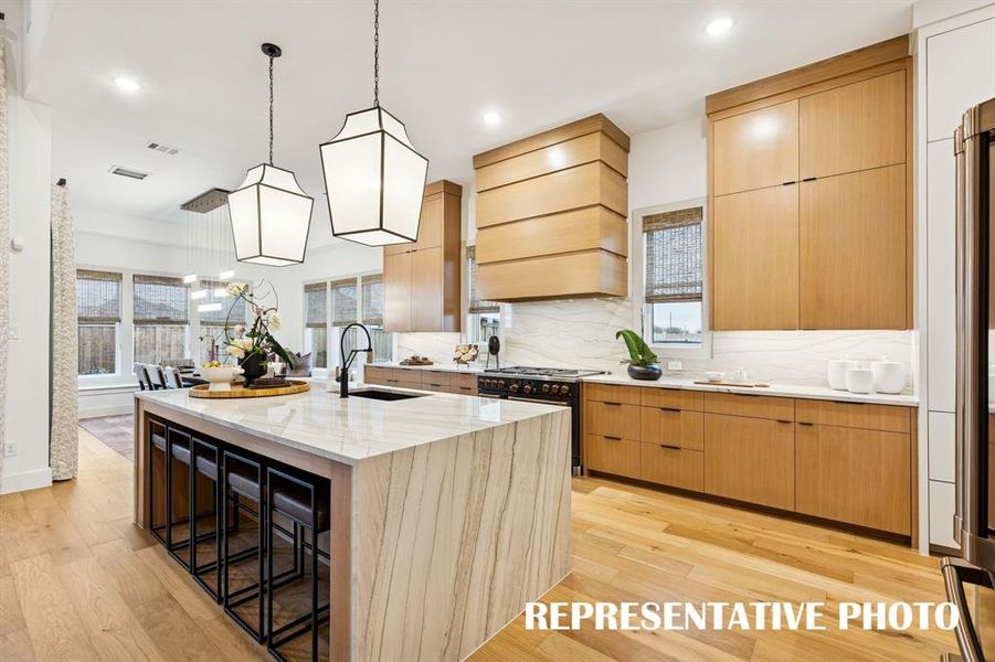 Bold and beautiful, the dream kitchen in our Hayden plan is all that you have dreamed of and more!  REPRESENTATIVE PHOTO