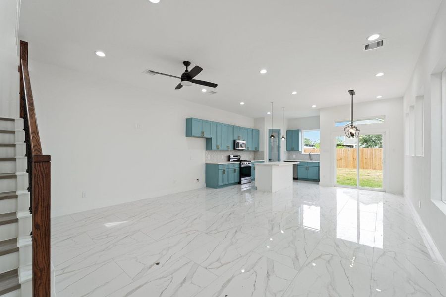 As you enter, this inviting floor plan opens up to an open concept kitchen and living room with an addition of a powder bath on first floor As you enter, this inviting floor plan opens up to an open concept kitchen and living room with an addition of a powder bath on first floor