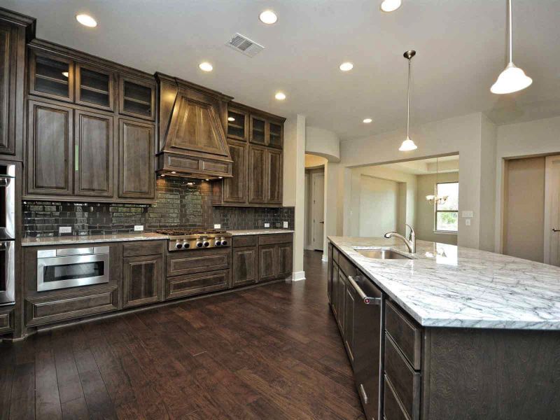 Representative furnished interior of a home built from the Madera II by Giddens Homes in Scofield Farms Estates, Georgetown (Image 267).