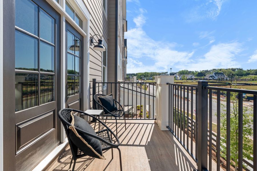 Representative furnished interior of a home built from the The Oleander by The Providence Group in Market Square at Sawnee Village, Cumming (Image 40).
