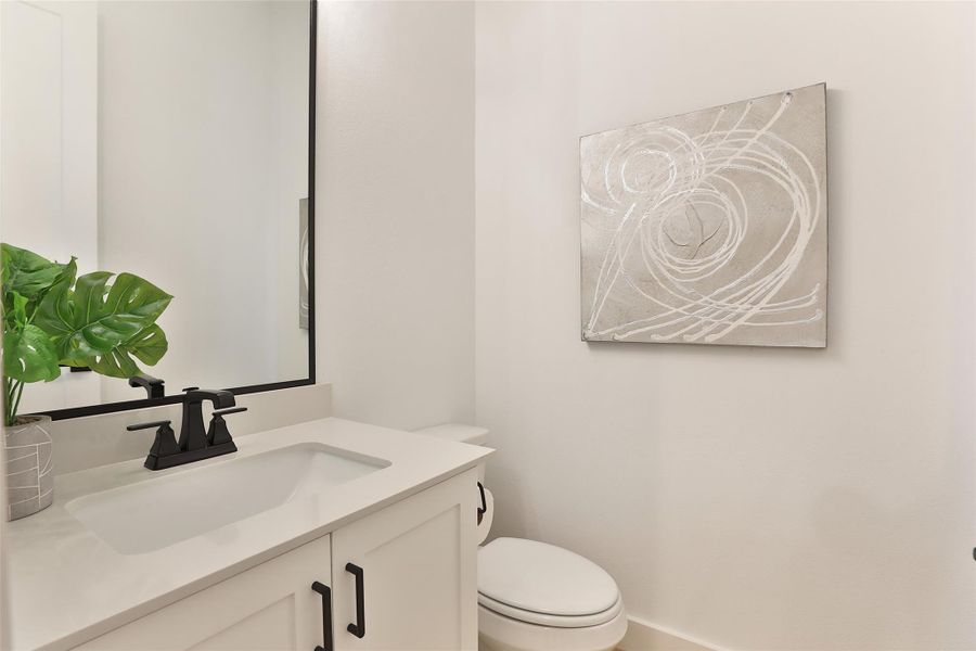 A convenient powder room for guests on the second floor. A convenient powder room for guests on the second floor.