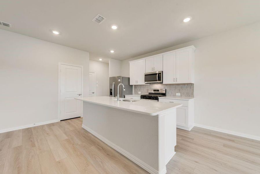 Furnished interior view inside a new home in Stella Hills, Denton (Image 12).