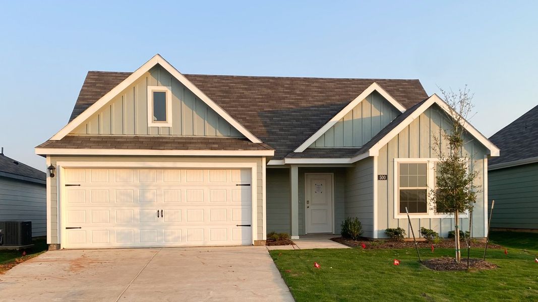 Front exterior of a new home in Creeks at Burnett Trail, Canton, TX, highlighting curb appeal (Image 1). Front exterior of a new home in Creeks at Burnett Trail, Canton, TX, highlighting curb appeal (Image 1).